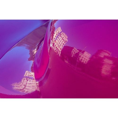 Reflection of buildings in trunk of hot pink classic American Oldsmobile Havana-Cuba